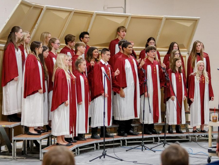 The high school choir shares their talent with the audience.