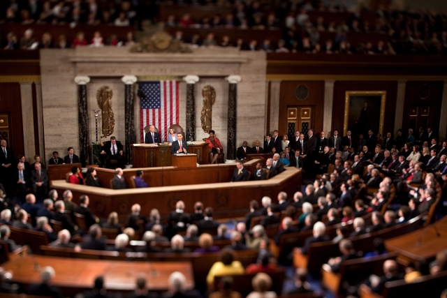 President Barack Obama gives his State of the Union address to a joint session of Congress in the House Chamber of the U.S. Capitol, Jan. 27, 2010. (Photo was shot with a tilt-shift lens) (Official White House Photo by Chuck Kennedy)This official White House photograph is being made available only for publication by news organizations and/or for personal use printing by the subject(s) of the photograph. The photograph may not be manipulated in any way and may not be used in commercial or political materials, advertisements, emails, products, promotions that in any way suggests approval or endorsement of the President, the First Family, or the White House.